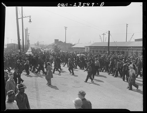 Bethlehem-Fairfield shipyards, Baltimore, Maryland. Shipyard workers leaving the plant