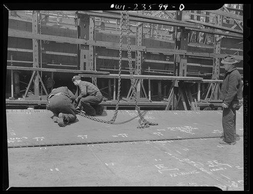 Bethlehem-Fairfield shipyards, Baltimore, Maryland. Erecting a bottom shell plate
