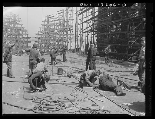 Bethlehem-Fairfield shipyards, Baltimore, Maryland. Regulating a bottom shell
