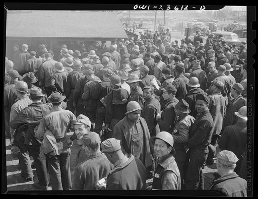Bethlehem-Fairfield shipyards, Baltimore, Maryland. Workers in line to cash pay checks