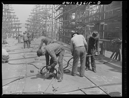Bethlehem-Fairfield shipyards, Baltimore, Maryland. Reaming the bottom shell seams