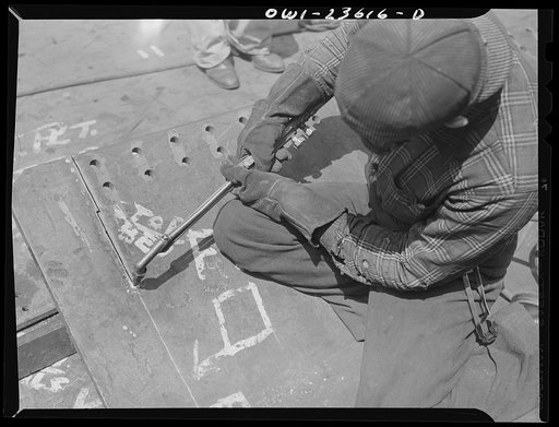 Bethlehem-Fairfield shipyards, Baltimore, Maryland. Burning a bottom shell plating