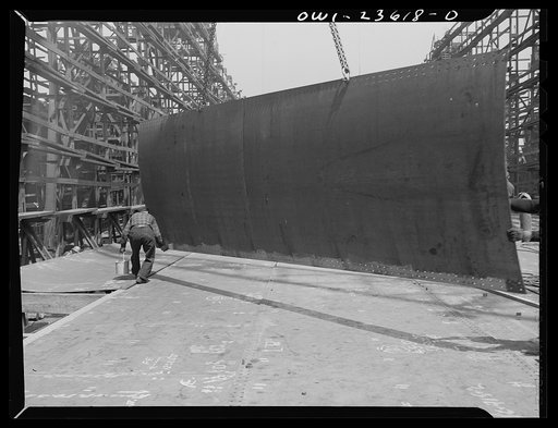 Bethlehem-Fairfield shipyards, Baltimore, Maryland. Painting the bottom shell seams