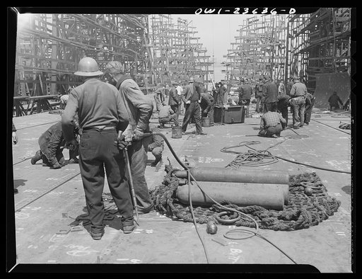 Bethlehem-Fairfield shipyards, Baltimore, Maryland. Working on bottom shell plating