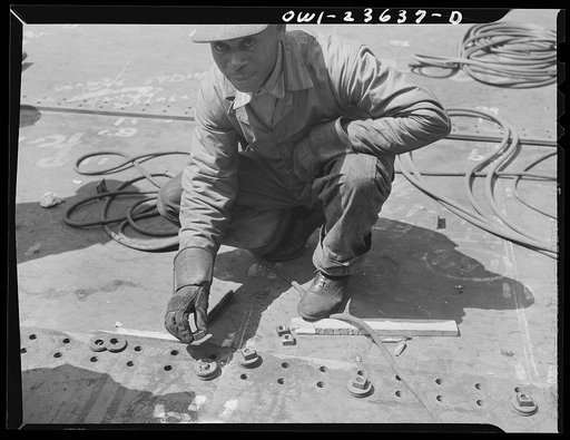 Bethlehem-Fairfield shipyards, Baltimore, Maryland. Bolting up bottom shell plating