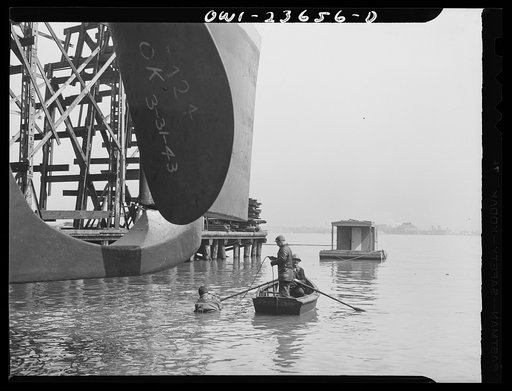Bethlehem-Fairfield shipyards, Baltimore, Maryland. Diver inspecting outboard launching ways