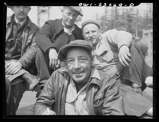 Bethlehem-Fairfield shipyards, Baltimore, Maryland. Workers resting during lunch hour