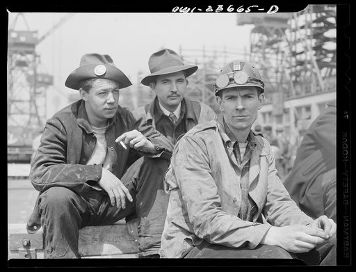 Bethlehem-Fairfield shipyards, Baltimore, Maryland. Workers resting during lunch hour