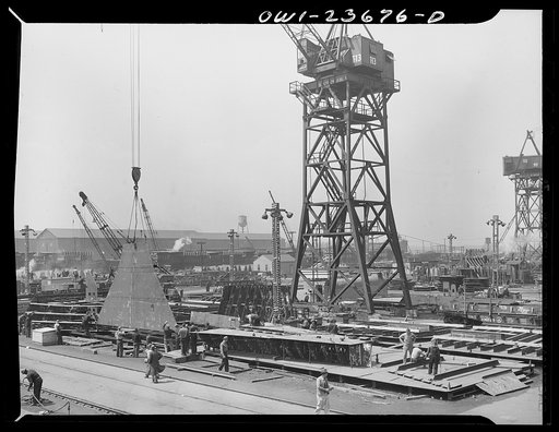 Bethlehem-Fairfield shipyards, Baltimore, Maryland. Tower crane working in a sub-assembly area
