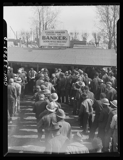 Bethlehem-Fairfield shipyards, Baltimore, Maryland. Workers cashing their pay checks