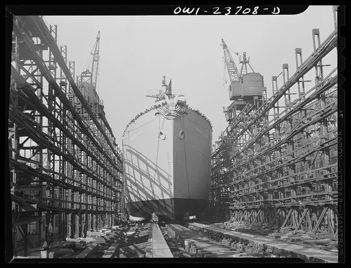 Bethlehem-Fairfield shipyards, Baltimore, Maryland. A vessel sliding down the ways