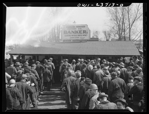 Untitled photo, possibly related to: Bethlehem-Fairfield shipyards, Baltimore, Maryland. Workers cashing their pay checks