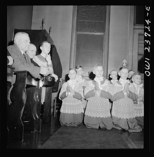 Buffalo, New York. Altar boys and lay brothers in the sacristy during Easter high mass at the Corpus Christi church in the Polish community