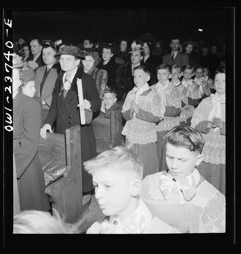 Untitled photo, possibly related to: Buffalo, New York. Altar boys in the procession at the Easter high mass at the Corpus Christi Church in the Polish community