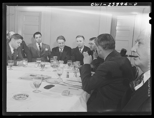 Niagara Falls, New York. Meeting of the Niagara Frontier regional committee of the United States War Manpower Commssion. After luncheon at the Lafayette Hotel, representatives of labor, industry and government are discussing problems of manpower and womanpower recruiting