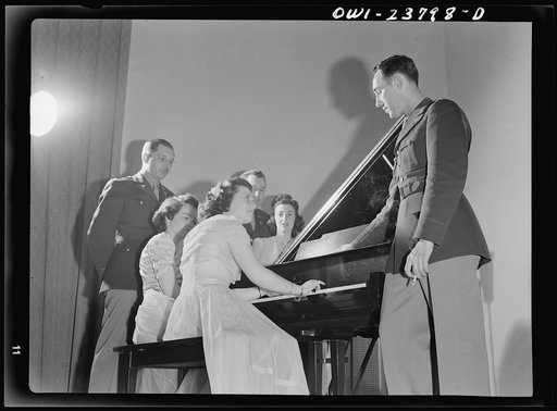 Untitled photo, possibly related to: All nursing and no play might make Frances Bullock (right) a dull girl! To preclude such a possibility, Army nurses hold dances in the nurses' home