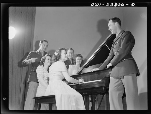 Untitled photo, possibly related to: All nursing and no play might make Frances Bullock (right) a dull girl! To preclude such a possibility, Army nurses hold dances in the nurses' home