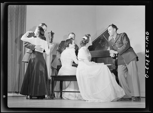 All nursing and no play might make Frances Bullock (right) a dull girl! To preclude such a possibility, Army nurses hold dances in the nurses' home