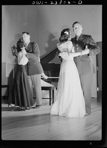 All nursing and no play might make Frances Bullock (right) a dull girl! To preclude such a possibility, Army nurses hold dances in the nurses' home