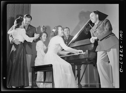 Untitled photo, possibly related to: All nursing and no play might make Frances Bullock (right) a dull girl! To preclude such a possibility, Army nurses hold dances in the nurses' home