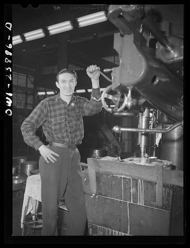 Untitled photo, possibly related to: Buffalo, New York. Bronislaus Nowak, precision lathe operator, is engaged to Cecelia Wrazen. Both work at Ross Heater, makers of condensers for the Navy. He is temporarily deferred from the Army because of his essential work. They are of Polish descent