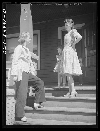 Untitled photo, possibly related to: Niagara Falls, New York. Nan Hannegan doing door to door recruiting for women to work in war plants. This program was organized by the War Manpower Commission in cooperation with local war plants who loaned nineteen women workers