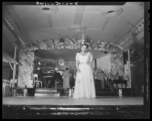 New York, New York. Duke Ellington's songstress, Betty Rocha, singing the "Salt Lake City Blues" during the floor show at the Hurricane Ballroom