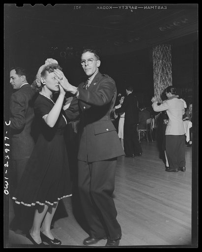 New York, New York. An army officer and friend dance to the music of Duke Ellington