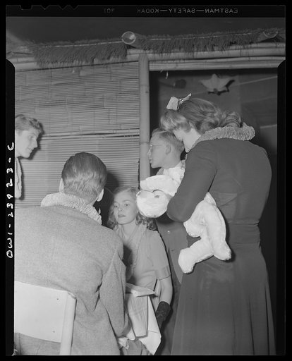 New York, New York. Girl selling souvenirs at the Hurricane Ballroom