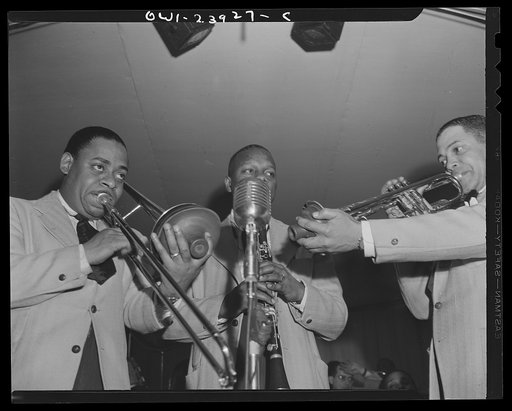 Untitled photo, possibly related to: New York, New York. A trio of musicians from Duke Ellington's orchestra during the early morning broadcast