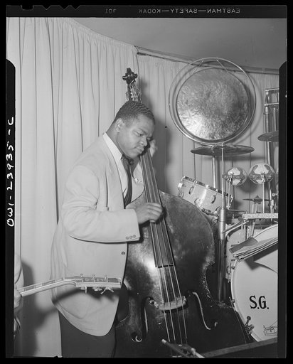 New York, New York. Bass fiddle player of Duke Ellington's orchestra at the Hurricane Ballroom