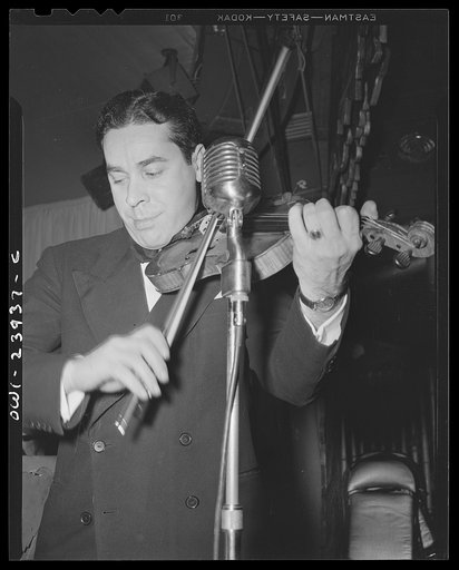 New York, New York. Orchestra leader who fills in for Duke Ellington at the Hurricane