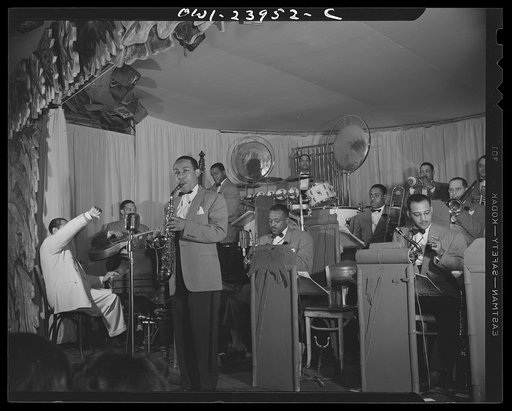 New York, New York. Johnny Hodges, rated as the world's best alto saxaphone player, plays Duke Ellington's "Don't Get Around Much Anymore"