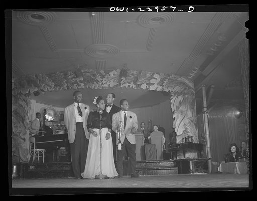 New York, New York. A section of Duke Ellington's band entertaining during a floor show at the Hurricane