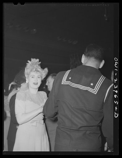 New York, New York. A sailor and his girlfriend dance at the Hurricane
