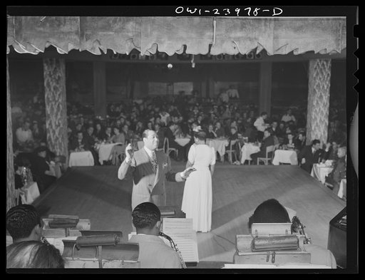 New York, New York. Duke Ellington directs his band during a floor show at the Hurricane Ballroom