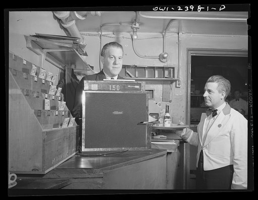 New York, New York. Food checker and waiter at the Hurricane