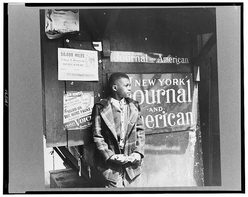 New York, New York. Harlem newsboy