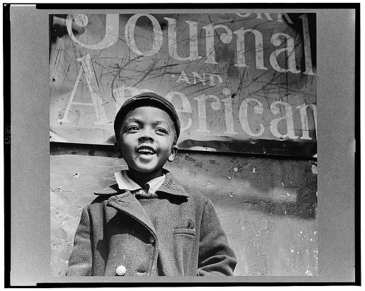 New York, New York. Harlem newsboy