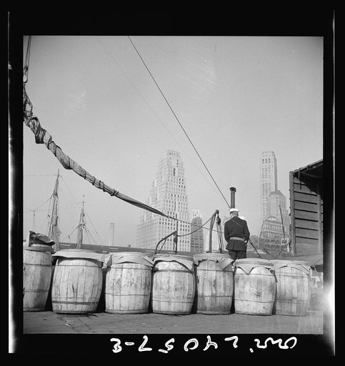 New York, New York. Barrels of fish on the docks at Fulton fish market ready to be shipped to retailers and wholesalers