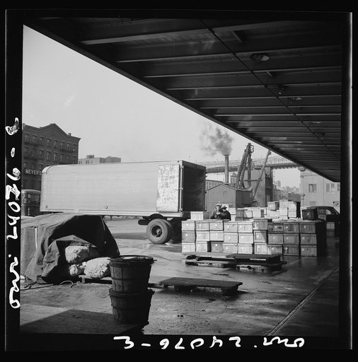New York, New York. Crates of seafood waiting for delivery at the Fulton fish market