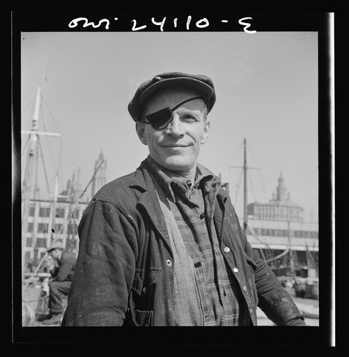New York, New York. Dock stevedore at the Fulton fish market