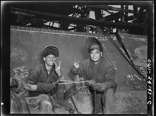 Baltimore, Maryland. Electric welders at work on the Liberty ship Frederick Douglass at the Bethlehem-Fairfield shipyards