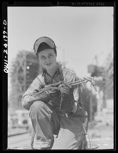 Baltimore, Maryland. A woman welder working on the construction of the Liberty ship Frederick Douglass, at the Bethlehem-Fairfield shipyards