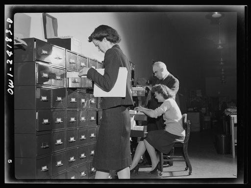 Untitled photo, possibly related to: Washington, D.C. OWI (Office of War Information) research workers
