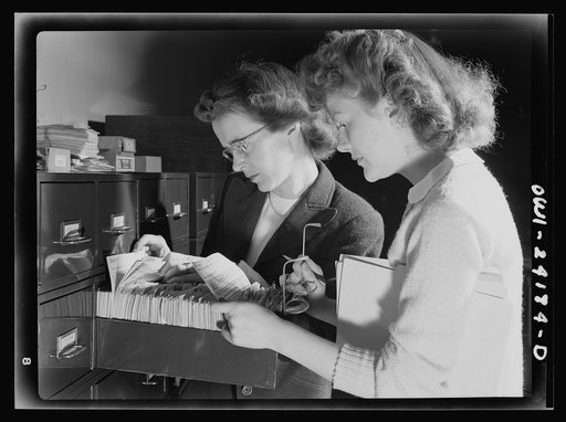 Untitled photo, possibly related to: Washington, D.C. OWI (Office of War Information) research workers