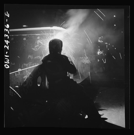 Bethlehem-Fairfield shipyards, Baltimore, Maryland. Welding on a hatch assembly at night