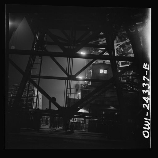 Bethlehem-Fairfield shipyards, Baltimore, Maryland. A view looking through a crane structure