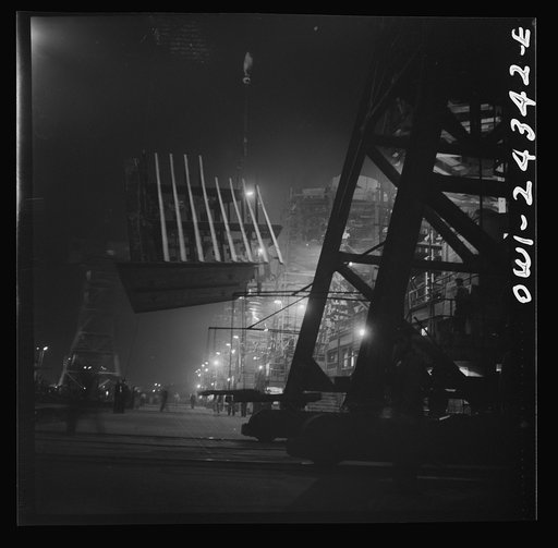 Untitled photo, possibly related to: Bethlehem-Fairfield shipyards, Baltimore, Maryland. Lifting an after peak section