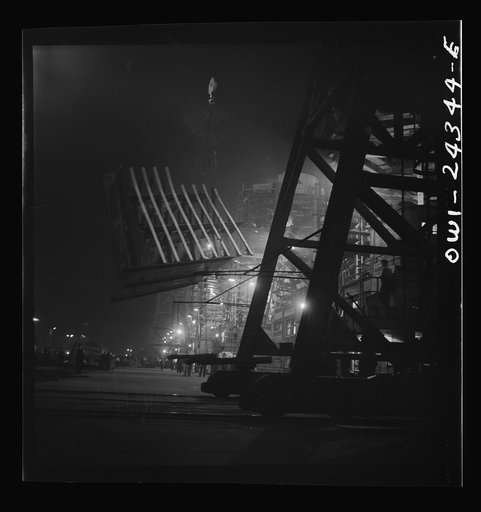 Bethlehem-Fairfield shipyards, Baltimore, Maryland. Lifting an after peak section